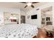 Main bedroom includes an ensuite bathroom and closet behind mirrored sliding doors at 1401 E Brentrup Dr, Tempe, AZ 85283