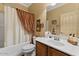 Inviting bathroom featuring shower, single sink vanity, and neutral color palette at 144 W Bahamas Dr, Casa Grande, AZ 85122
