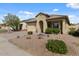Charming single-Gathering home with desert landscaping and inviting curb appeal at 144 W Bahamas Dr, Casa Grande, AZ 85122