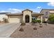 Charming single-story home with a well-maintained front yard and covered entry in a sunny setting at 144 W Bahamas Dr, Casa Grande, AZ 85122
