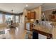 Cozy kitchen featuring granite counters, stainless appliances, and a dining area with bay window at 144 W Bahamas Dr, Casa Grande, AZ 85122