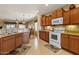 Well-equipped kitchen with granite countertops, modern appliances, and a functional open layout at 144 W Bahamas Dr, Casa Grande, AZ 85122