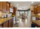Bright kitchen featuring granite countertops, modern appliances, and a cozy breakfast nook area at 144 W Bahamas Dr, Casa Grande, AZ 85122