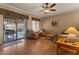 Relaxing living area with a sliding glass door leading to a covered patio and a well-manicured yard at 144 W Bahamas Dr, Casa Grande, AZ 85122