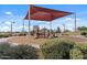 Community playground for outdoor fun and recreation on a sunny day at 144 W Bahamas Dr, Casa Grande, AZ 85122