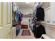 Spacious walk-in closet with ample storage for clothing, shoes and accessories at 144 W Bahamas Dr, Casa Grande, AZ 85122