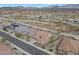 Expansive aerial view showcases desert community homes and landscape with mountain backdrop at 14939 S 185Th Ave, Goodyear, AZ 85338