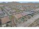 Aerial shot showing homes with backyard pools and desert landscaping, offering serene living at 14939 S 185Th Ave, Goodyear, AZ 85338