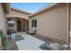 Charming entryway with desert landscaping, bench seating, and stylish decor at 14939 S 185Th Ave, Goodyear, AZ 85338