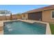Gorgeous pool with a soothing water feature and easy access steps at 14939 S 185Th Ave, Goodyear, AZ 85338