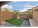 Enclosed patio featuring artificial turf, seating, and scenic mountain views at 1545 E Sahuaro Dr # 12, Phoenix, AZ 85020