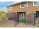 Cozy patio and landscaped backyard with gated access providing a private outdoor space at 1545 E Sahuaro Dr # 12, Phoenix, AZ 85020