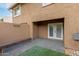 Back patio with pavers, bench seating, and artificial grass at 1545 E Sahuaro Dr # 12, Phoenix, AZ 85020