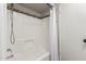 Clean bathroom featuring a tiled shower with modern fixtures at 1545 E Sahuaro Dr # 12, Phoenix, AZ 85020