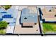 Aerial view of the property, highlighting the backyard, covered patio, landscaping, and overall lot layout at 16010 N 64Th Dr, Glendale, AZ 85306