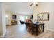 Charming dining area with wood-look flooring and abundant natural light at 16010 N 64Th Dr, Glendale, AZ 85306