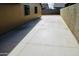 Long and wide concrete side yard of house, allowing great space for cars or gatherings at 16010 N 64Th Dr, Glendale, AZ 85306
