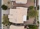 Bird's-eye view of a meticulously maintained home, showcasing the terracotta roof, verdant landscaping, and privacy walls at 16155 E Glenview Pl, Fountain Hills, AZ 85268