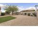 Large backyard with mature tree, turf accent and gravel ground cover at 16155 E Glenview Pl, Fountain Hills, AZ 85268