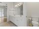 Bathroom with double sinks, tile floors and modern vanity at 16155 E Glenview Pl, Fountain Hills, AZ 85268