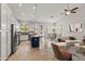 Spacious kitchen boasting an island with seating, granite countertops, and stainless steel appliances at 16155 E Glenview Pl, Fountain Hills, AZ 85268