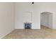 Living room featuring a fireplace and neutral color scheme at 16155 E Glenview Pl, Fountain Hills, AZ 85268