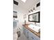 Bright bathroom featuring wood counters and white tile at 16857 E Deuce Ct, Fountain Hills, AZ 85268