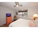 Comfortable bedroom with ample natural light and a ceiling fan at 16857 E Deuce Ct, Fountain Hills, AZ 85268