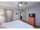 Bedroom with a dresser and closet access at 16857 E Deuce Ct, Fountain Hills, AZ 85268