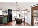Charming dining area featuring terra cotta flooring and abundant natural light at 16857 E Deuce Ct, Fountain Hills, AZ 85268