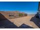Spacious backyard with a view of the surrounding mountain landscape and sturdy fencing at 21430 W Meadowbrook Ave, Buckeye, AZ 85396