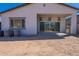 The house's backyard has a full patio area and a view of the mountain at 21430 W Meadowbrook Ave, Buckeye, AZ 85396