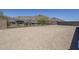 Large backyard featuring block wall and wrought iron fencing offering mountain views at 21450 W Meadowbrook Ave, Buckeye, AZ 85396