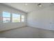 Bedroom featuring carpet, recessed lighting, and several windows providing a great view at 21450 W Meadowbrook Ave, Buckeye, AZ 85396