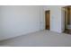 Clean and inviting bedroom with neutral walls and plush carpet providing a comfortable and serene ambiance at 21450 W Meadowbrook Ave, Buckeye, AZ 85396