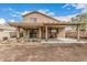 Home exterior with a covered patio and space for gardening at 22337 E Via Del Palo --, Queen Creek, AZ 85142