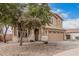Lovely home boasting mature landscaping, a covered entry, and a convenient two-car garage at 22337 E Via Del Palo --, Queen Creek, AZ 85142