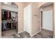 Hallway featuring doorways to walk-in closets at 22337 E Via Del Palo --, Queen Creek, AZ 85142