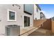 Low-maintenance backyard with patio, sliding door access, and new AC unit at 2823 W Eagle Talon Rd, Phoenix, AZ 85085