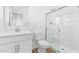 This bathroom features a white vanity, toilet, and glass-enclosed shower at 2823 W Eagle Talon Rd, Phoenix, AZ 85085