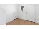 Hallway with wood-look flooring and doors at 2823 W Eagle Talon Rd, Phoenix, AZ 85085