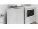 This laundry room features a new washer and dryer at 2823 W Eagle Talon Rd, Phoenix, AZ 85085