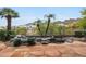 Beautiful backyard featuring desert landscaping, a pond, and a mountain view at 3120 E Squaw Peak Cir, Phoenix, AZ 85016