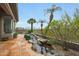 Charming backyard featuring lush landscaping and a tranquil rock waterfall feature at 3120 E Squaw Peak Cir, Phoenix, AZ 85016