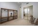 Spacious bedroom with built-in shelving, sliding door closet and ample natural light at 3120 E Squaw Peak Cir, Phoenix, AZ 85016