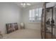 Bright bedroom with natural light, a ceiling fan, and modern window shutters at 3120 E Squaw Peak Cir, Phoenix, AZ 85016