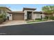 Charming single-story home featuring desert landscaping, a two car garage, and a covered front entrance at 3120 E Squaw Peak Cir, Phoenix, AZ 85016