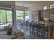 Open kitchen with island seating, stainless appliances, and mountain views at 3120 E Squaw Peak Cir, Phoenix, AZ 85016