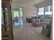 Spacious living room with tile floors, natural light and elegant furnishings at 3120 E Squaw Peak Cir, Phoenix, AZ 85016