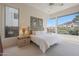Bright main bedroom boasting an abundance of natural light from large windows at 3120 E Squaw Peak Cir, Phoenix, AZ 85016